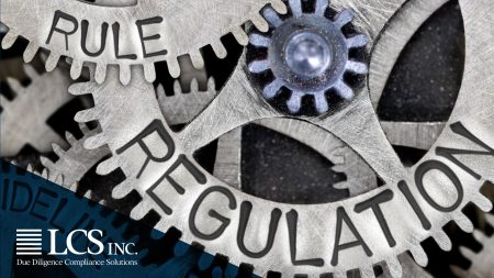 gears with the words "regulation" and "rule" imprinted on the metal